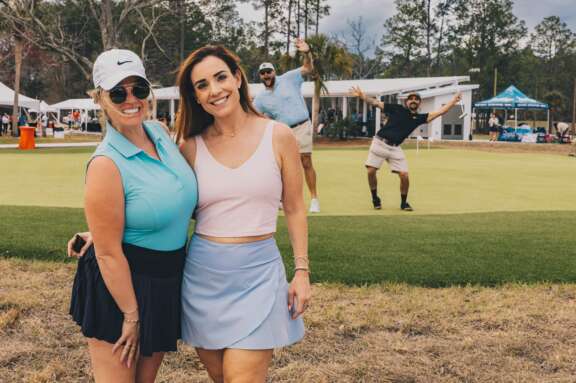 Guests enjoying Pine Royale's grand opening celebration in Callahan Florida