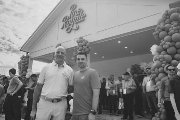 DLP Capital team smiling at grand opening ribbon cutting in Callahan FL